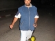 011-aziz-on-motor-skateboard.JPG